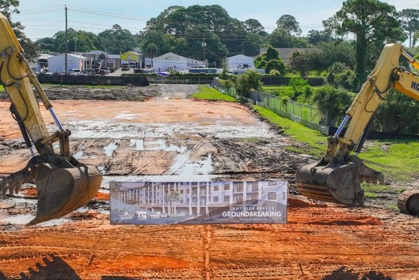 Bull dozers clearing the lot for the groundbreaking of Bayside Breeze.