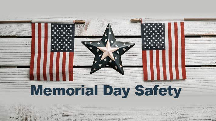 Memorial Day Safety. Two small American flags on each side of a star